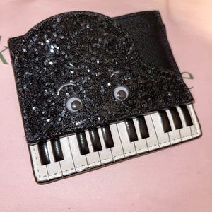 Kate spade Jazz thing up piano 🎹